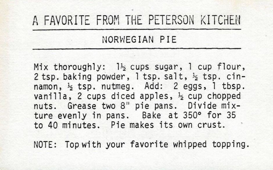 Norwegian pie recipe typed on paper with apples, spices, and note about whipped topping
