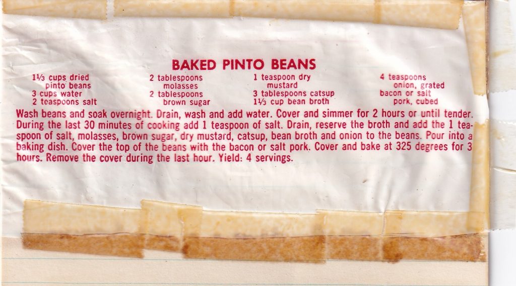 Baked Pinto Beans recipe cut from a plastic package and taped to a recipe card