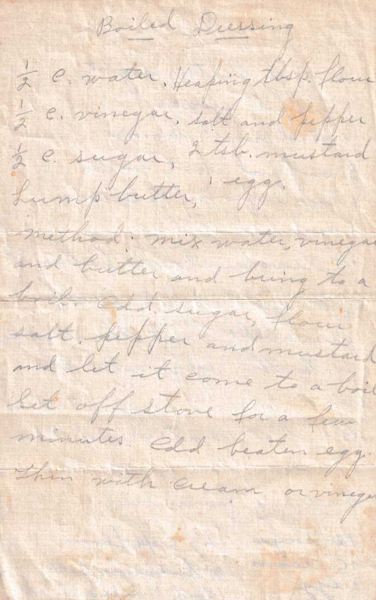 Handwritten Boiled Dressing recipe on aged paper with ingredients and directions for a cooked vinegar, mustard and egg dressing.