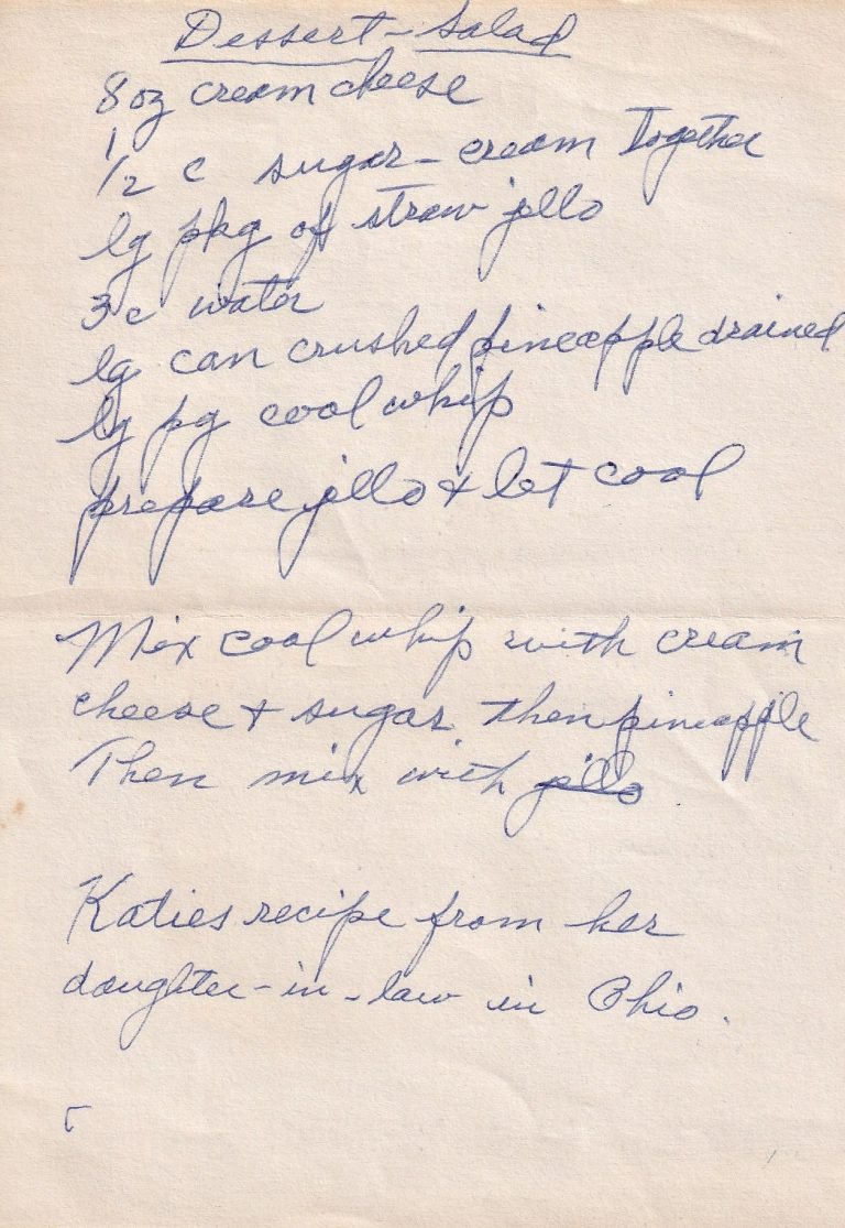 A handwritten recipe for Katie’s Dessert Salad, a fluffy mix of strawberry Jell-O, crushed pineapple, cream cheese and Cool Whip, with a little family trail stretching all the way to Ohio.