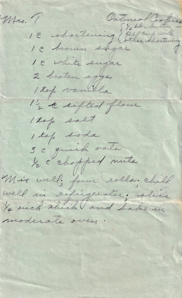 Handwritten Mrs. T’s Oatmeal Cookies recipe on pale green paper with ingredients and directions for refrigerator-style oatmeal cookies.