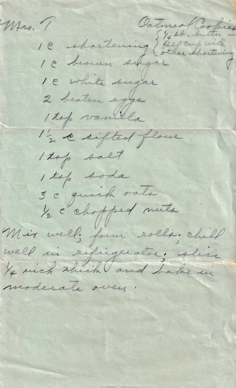 Handwritten Mrs. T’s Oatmeal Cookies recipe on pale green paper with ingredients and directions for refrigerator-style oatmeal cookies.