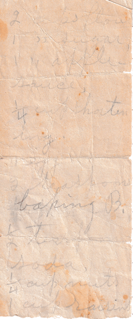 Handwritten Applesauce Cookies recipe on an aged, folded piece of paper